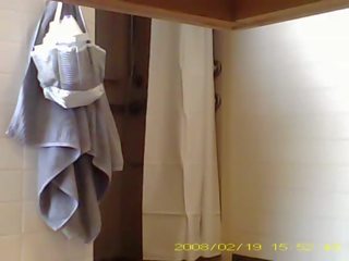 Spying sexy 19 year old darling showering in dorm bathroom
